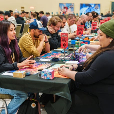Many players, like these at 2024's Disney Lorcana Challenge in Seattle, connect over shared interests in the game and Disney itself, which Lorcana co-creator Ryan Miller called "part of our cultural DNA."