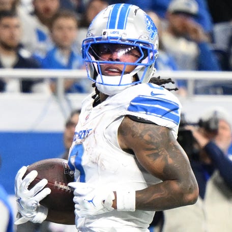 Detroit Lions running back Jahmyr Gibbs (0) scores a touchdown during the second half against the Dallas Cowboys at Ford Field.