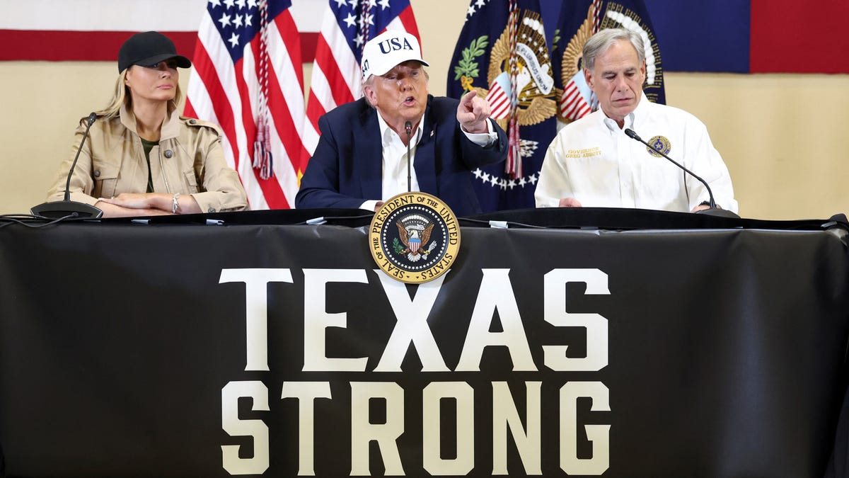 U.S. President Donald Trump, first lady Melania Trump and Texas Governor Greg Abbott participate in a roundtable with first responders and local officials, at Hill Country Youth Center, in Kerrville, Texas, U.S., July 11, 2025.