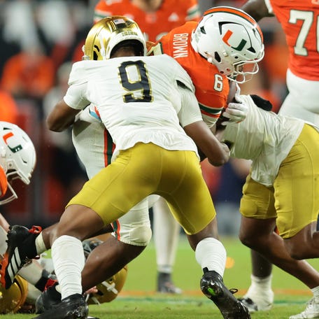Miami running back CharMar Brown (6) rushes the ball against Notre Dame during their game at Hard Rock Stadium.