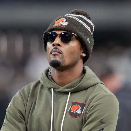 Nov 23, 2025; Paradise, Nevada, USA; Cleveland Browns quarterback Deshaun Watson watches on the sidelines against the Las Vegas Raiders in the second half at Allegiant Stadium.