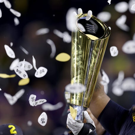 HOUSTON, TEXAS - JANUARY 08: A detail of the College Football Playoff National Championship Trophy after the Michigan Wolverines defeated the Washington Huskies 34-13 in the 2024 CFP National Championship game at NRG Stadium on January 08, 2024 in Houston, Texas. (Photo by Maddie Meyer/Getty Images)
