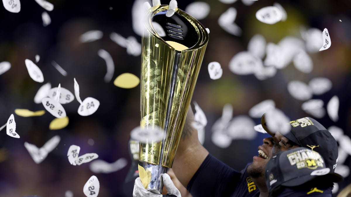 HOUSTON, TEXAS - JANUARY 08: A detail of the College Football Playoff National Championship Trophy after the Michigan Wolverines defeated the Washington Huskies 34-13 in the 2024 CFP National Championship game at NRG Stadium on January 08, 2024 in Houston, Texas. (Photo by Maddie Meyer/Getty Images)