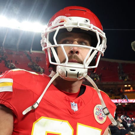 Travis Kelce #87 of the Kansas City Chiefs reacts after his team was defeated by the Houston Texans at Arrowhead Stadium on December 07, 2025 in Kansas City, Missouri.