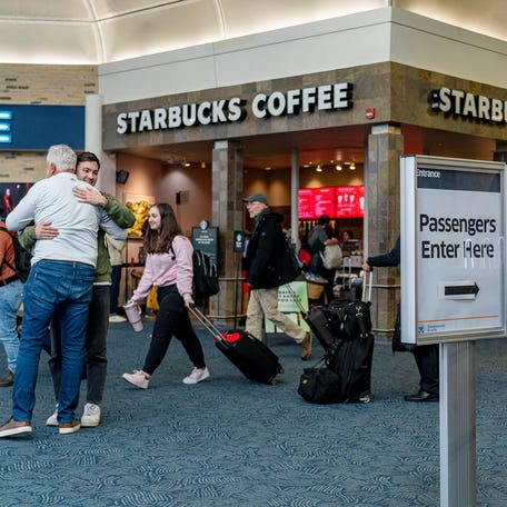 Holiday travelers arrive at Milwaukee Mitchell International Airport on Wednesday November 22, 2023, in Milwaukee, Wis.