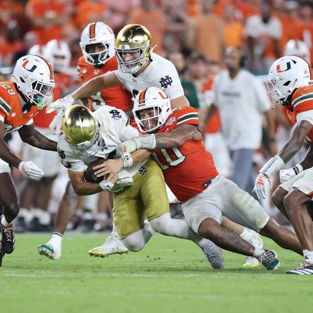 MIAMI GARDENS, FLORIDA - AUGUST 31: CJ Carr #13 of the Notre Dame Fighting Irish rushes against the Miami Hurricanes during the second half at Hard Rock Stadium on August 31, 2025 in Miami Gardens, Florida. (Photo by Carmen Mandato/Getty Images)