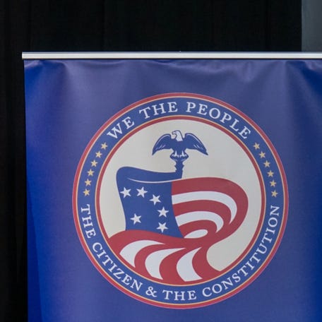 Sixty-two people were naturalized as United States citizens during a natuaralization ceremony at Union Station in Indianapolis, on Tuesday, Dec. 9, 2025.