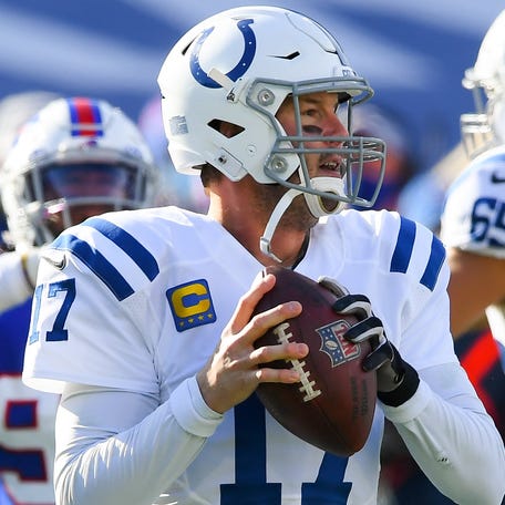 Jan 9, 2021; Orchard Park, New York, USA; Indianapolis Colts quarterback Philip Rivers (17) drops back to pass against the Buffalo Bills during the first quarter of a AFC Wild Card game at Bills Stadium. Mandatory Credit: Rich Barnes-USA TODAY Sports