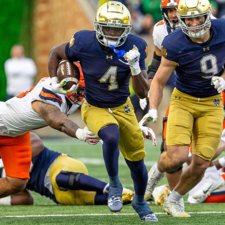 Notre Dame running back Jeremiyah Love (4) breaks loose for a touchdown run against Syracuse during the first half at Notre Dame Stadium on Nov. 22, 2025, in South Bend, Ind.