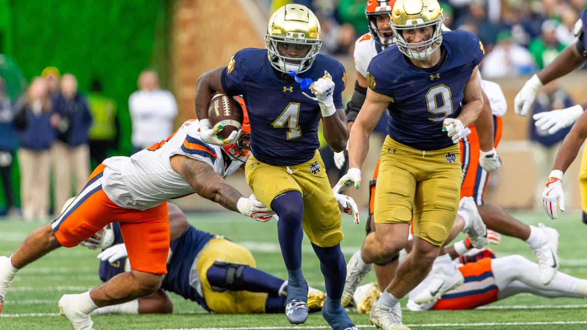 Notre Dame running back Jeremiyah Love (4) breaks loose for a touchdown run against Syracuse during the first half at Notre Dame Stadium on Nov. 22, 2025, in South Bend, Ind.