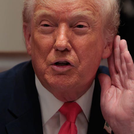 President Donald Trump attends a meeting of his Cabinet in the Cabinet Room of the White House on Dec. 2, 2025 in Washington, D.C.