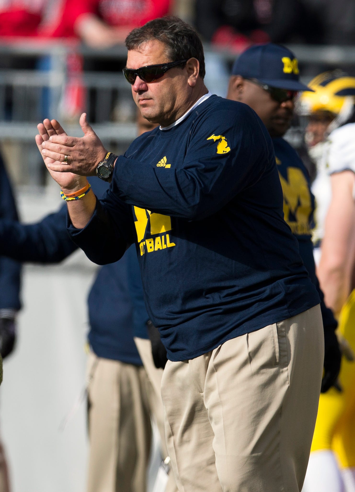 Michigan Wolverines head coach Brady Hoke watches his team warm up before the game against the Ohio State Buckeyes at Ohio Stadium.