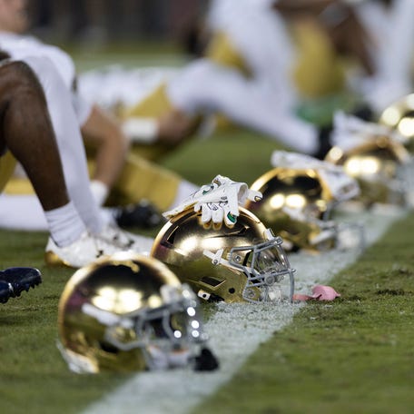 Nov 29, 2025; Stanford, California, USA; General view of the helmets to the Notre Dame Fighting Irish before the start of the first quarter against the Stanford Cardinal at Stanford Stadium. Mandatory Credit: Stan Szeto-Imagn Images