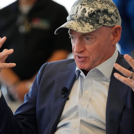 Senator Mark Kelly, D-Ariz., answers questions during a town hall in Scottsdale on Medicaid cuts March 17, 2025.