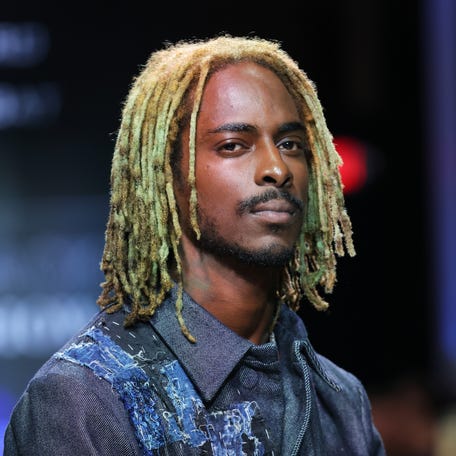 Clinton Adams, aka Clintn Lord, walks the runway wearing Clark Sabbat during the Seventh Annual Blue Jacket Fashion Show at Moonlight Studios on Feb. 1, 2023, in New York City.