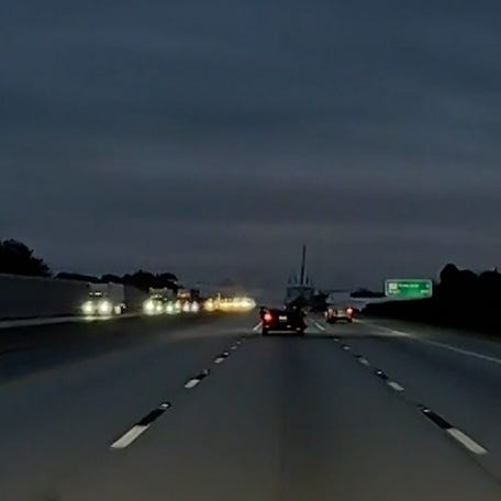 Plane crashes onto car on I-95