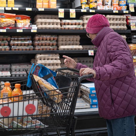 A customer shops for eggs at a grocery store on March 12, 2025 in Chicago, Illinois.