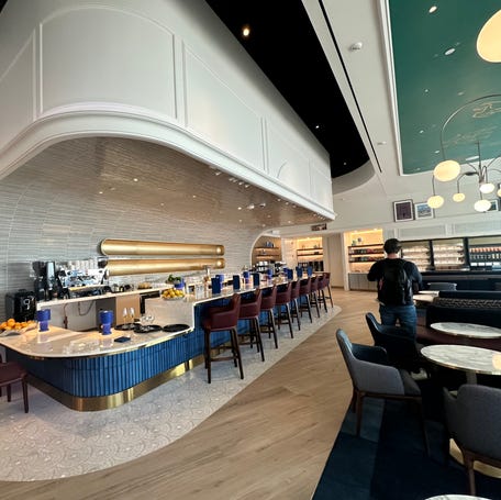 A wider view of the bar on the first floor of BlueHouse.