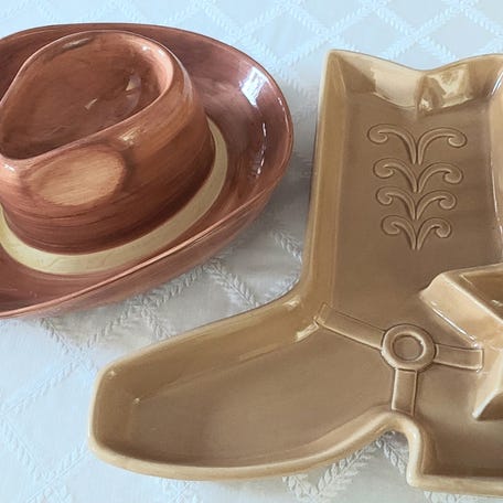 So, after the sombrero drew hearty guffaws, my friend Jim busied himself finding monuments to chip-and-dip tastelessness. Like the beer and pretzels motif with a mug for salsa. Or a yellow cowboy boot, with a Texas Lone Star, pictured here.