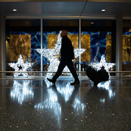 December 26, 2024: Travelers make their way through the airport the day after Christmas at Phoenix Sky Harbor International Airport in Phoenix.