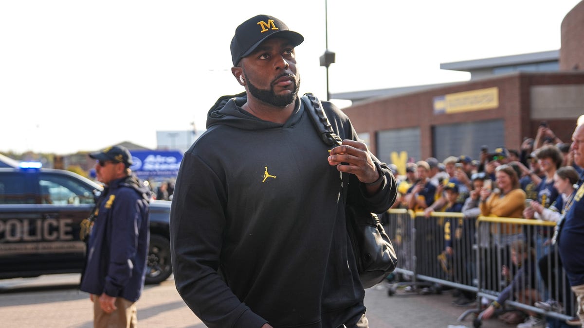Michigan head coach Sherrone Moore arrives ahead of the Washington game at Michigan Stadium in Ann Arbor on Saturday, Oct. 18, 2025.