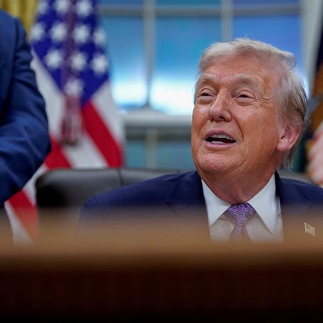 U.S. President Donald Trump speaks prior to signing an executive order on AI, in the Oval Office at the White House in Washington, D.C., U.S. December 11, 2025. REUTERS/Al Drago