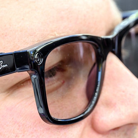 An audience member watches the Meta Connect Developer Conference keynote while wearing Ray-Ban Meta 2nd generation smart glasses at Meta's headquarters in Menlo Park, California on Sept. 27, 2023.