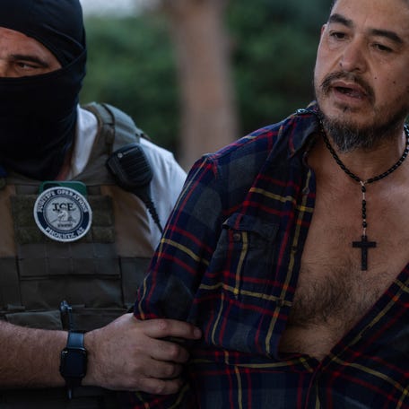 A 47-year-old Mexican man with three convictions for driving under the influence, is arrested by federal law enforcement agents led by U.S. Immigration and Customs Enforcement south of Atlanta, Georgia, February 5, 2025. REUTERS/Carlos Barria