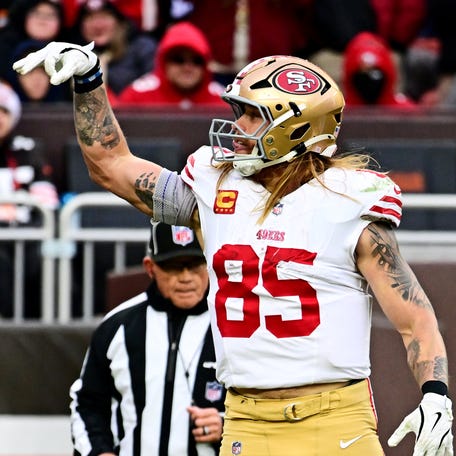 Nov 30, 2025; Cleveland, Ohio, USA; San Francisco 49ers tight end George Kittle (85) reacts after catching a long pass during the second half against the Cleveland Browns at Huntington Bank Field.