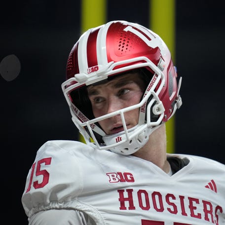 Dec 6, 2025; Indianapolis, IN, USA; Indiana Hoosiers quarterback Fernando Mendoza (15) looks on before the 2025 Big Ten championship game against the Ohio State Buckeyes at Lucas Oil Stadium. Mandatory Credit: Aaron Doster-Imagn Images