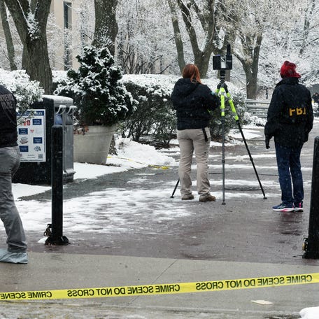 Local and federal police investigate a mass shooting at Brown University on Sunday, Dec. 14 2025.