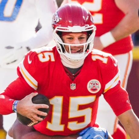 Dec 14, 2025; Kansas City, Missouri, USA; Los Angeles Chargers linebacker Troy Dye (43) sacks Kansas City Chiefs quarterback Patrick Mahomes (15) during the first quarter at GEHA Field at Arrowhead Stadium. Mandatory Credit: Denny Medley-Imagn Images