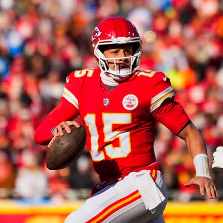 Dec 14, 2025; Kansas City, Missouri, USA; Kansas City Chiefs quarterback Patrick Mahomes (15) looks to pass against the Los Angeles Chargers during the second quarter at GEHA Field at Arrowhead Stadium.