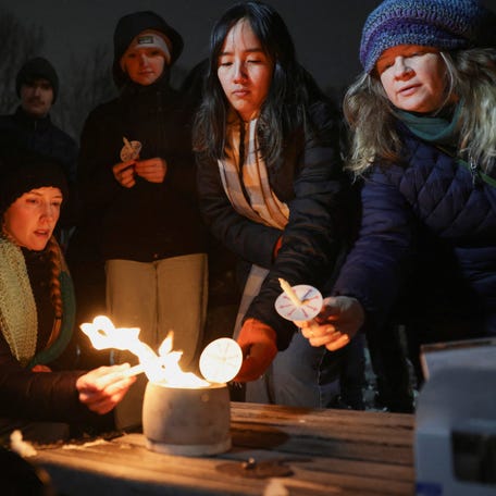 A vigil the evening after Brown University was locked down amid reports of a shooting on campus in Providence, Rhode Island, on Dec. 14, 2025.