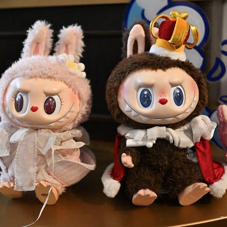 Labubus  Labubus, the beloved (and sometimes despised) Pop Mart dolls, truly took over 2025. With their fuzzy footy pajamas, glaring eyes and sharp fangs, all wrapped up a blind box, Labubus will likely go down as one of the year's most iconic products. Throughout the year, Chinese toy company Pop Mart has released countless Labubus, including a Halloween collection, miniature series and Coca-Cola-branded collection. The toys, often sold in blind boxes so customers don't know which character they are getting, are available as keychains, action figurines and jewelry.