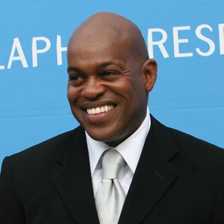 Jubilant Sykes, along with Carlos Santana (left) arrive at the 2006 Hollywood Bowl Hall of Fame Inductees Concert at the Hollywood Bowl on June 23, 2006, in Los Angeles.