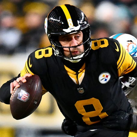 PITTSBURGH, PENNSYLVANIA - DECEMBER 15: Aaron Rodgers #8 of the Pittsburgh Steelers is sacked by Jordyn Brooks #20 of the Miami Dolphins in the first quarter of the game at Acrisure Stadium on December 15, 2025 in Pittsburgh, Pennsylvania. (Photo by Joe Sargent/Getty Images)