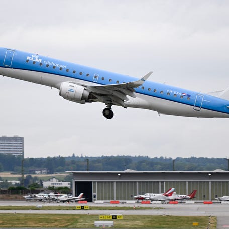 An Embraer 190 Cityhopper passenger plane of Dutch airline KLM takes off from Stuttgart Airport in Leinfelden-Echterdingen near Stuttgart, southwestern Germany, on July 28, 2023.