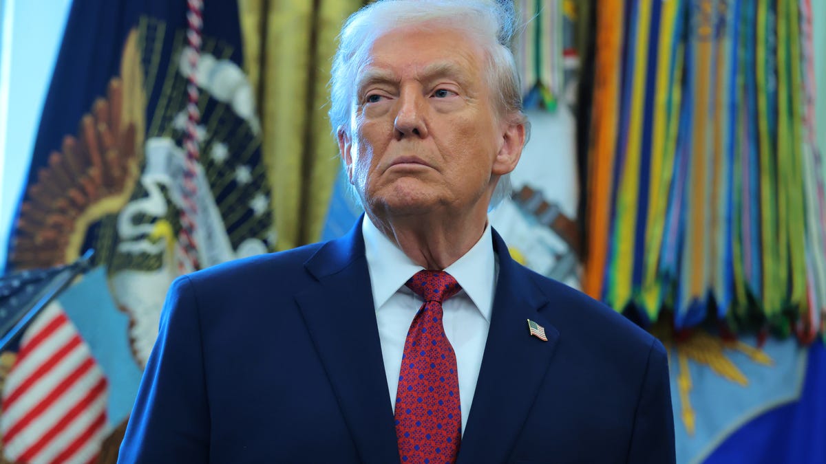 President Donald Trump listens during a ceremony for the presentation of the Mexican Border Defense Medal in the Oval Office of the White House on December 15, 2025 in Washington, DC.