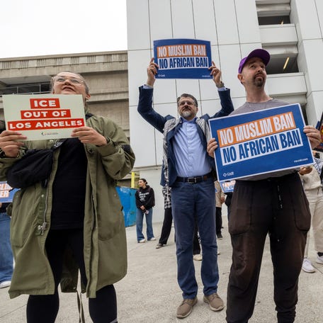 People take part in a protest sponsored by the Council on American Islamic Relations (CAIR) against U.S. President Donald Trump's new sweeping travel ban at Los Angeles International Airport (LAX) in Los Angeles, California, U.S., June 9, 2025. REUTERS/Jill Connelly
