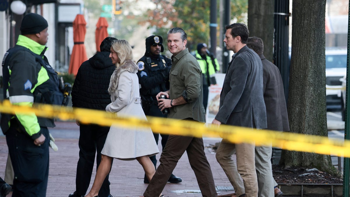 Police secure a sidewalk for U.S. Defense Secretary Pete Hegseth as he and his family arrive for Sunday morning worship at a church on a block of storefronts on Capitol Hill in Washington, D.C., U.S., December 7, 2025. REUTERS/Jonathan Ernst TPX IMAGES OF THE DAY