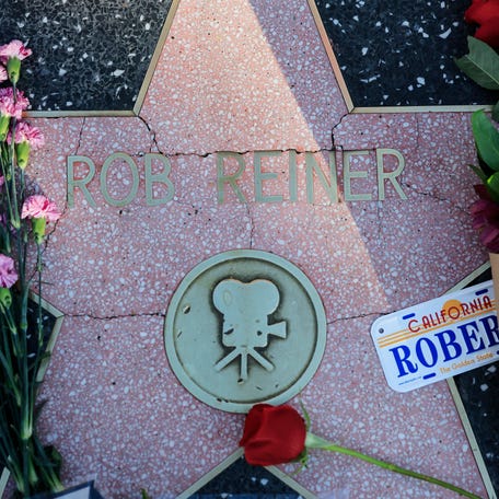 Flowers rest on Rob Reiner's star on the Hollywood Walk of Fame on December 15, 2025 in Los Angeles, California. The LAPD confirmed that Rob Reiner and his wife Michele Singer Reiner were found dead in their Brentwood home. Their son Nick has been arrested in connection to their deaths.