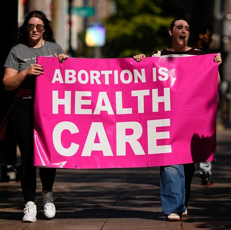 Pro-choice demonstrators rally outside the Ohio Statehouse in Columbus on Oct. 3, 2025.