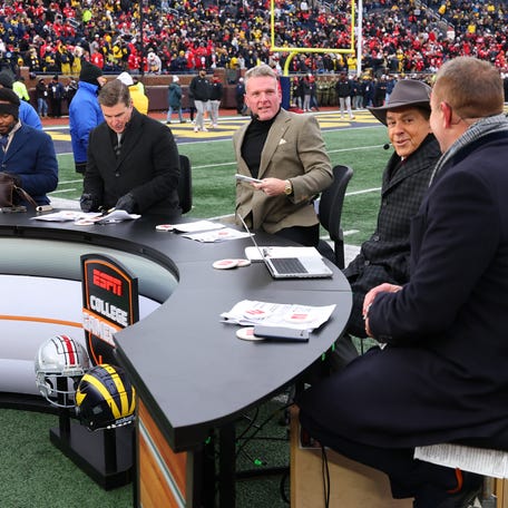 The ESPN College Gameday crew is seen on set prior to the game between the Michigan Wolverines and the Ohio State Buckeyes at Michigan Stadium on November 29, 2025 in Ann Arbor, Michigan.