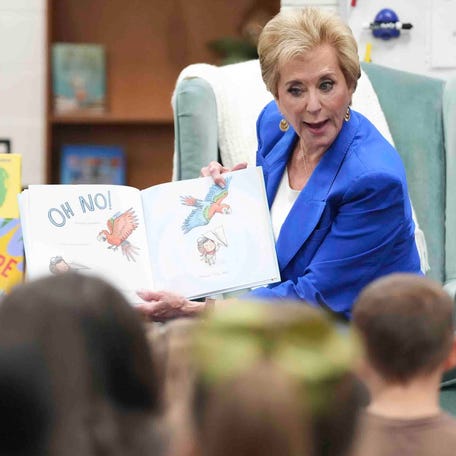Education Secretary Linda McMahon reads a book to students in Clinton, Tennessee, on Aug. 13, 2025.