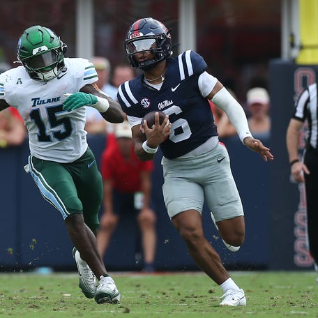Sep 20, 2025; Oxford, Mississippi, USA; Mississippi Rebels quarterback Trinidad Chambliss (6) runs the ball as Tulane Green Wave linebacker Sam Howard (15) pursues during the second quarter at Vaught-Hemingway Stadium. Mandatory Credit: Petre Thomas-Imagn Images