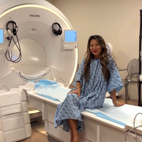 Jennifer Worman is a fashion influencer. But this past November, she traded her usual luxury look for a hospital gown in downtown Chicago.