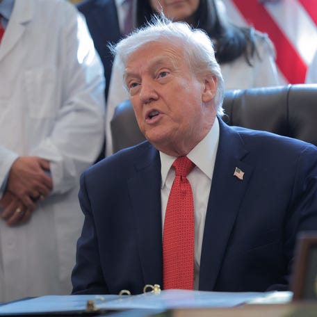 President Donald Trump speaks before signing a series of executive orders in the Oval Office of the White House on Dec. 18, 2025 in Washington, DC. During the ceremony, Trump signed an order reclassifying marijuana as a schedule III drug.