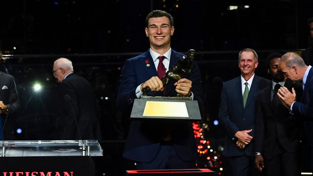Indiana Hoosiers quarterback Fernando Mendoza wins the Heisman Trophy during the trophy presentation.