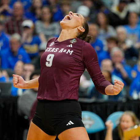 Dec 18, 2025; Kansas City, MO, USA; Texas A&M Aggies opposite Logan Lednicky (9) celebrates after a point during the second set against the Pittsburgh Panthers in a 2025 NCAA Women's Volleyball Championship semifinal match at T-Mobile Center. Mandatory Credit: Jay Biggerstaff-Imagn Images